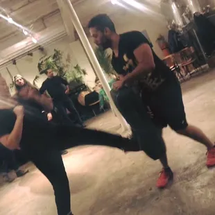 Me trying to kick! At a self defense workshop that was held at seventh son.