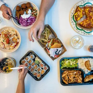 a table full of food and drinks
