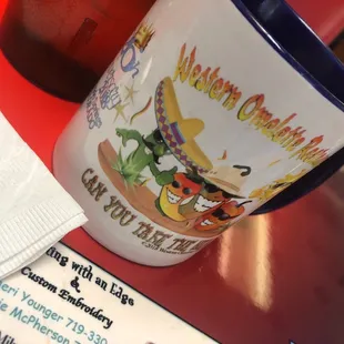 a coffee cup and menu