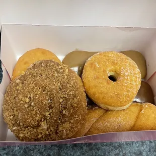 a variety of donuts in a box