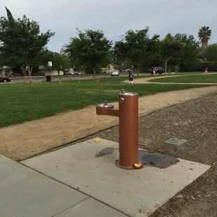 Water fountain next to the running track