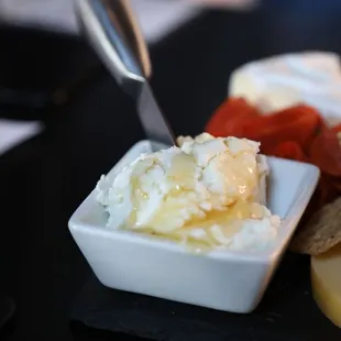 a plate of cheese and crackers