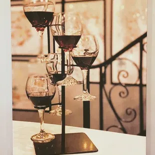 a display of wine glasses and bottles