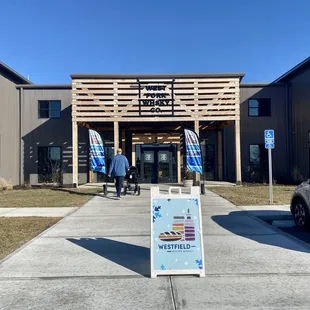 Entrance. Walk into West Fork Whisky and follow the signs to go to their event space where the market is hosted.