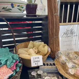 The tall brown thing to the right is the loofah and you break off the brown part and underneath is the loofah.