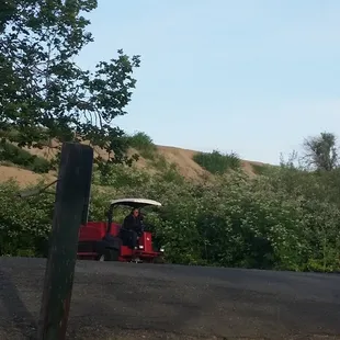 7:00 am Monday mowing the lawn, rode right past my tent.