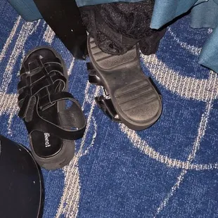 I don't know who left their shoes under a curtain but they aren't mine.