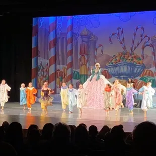 a group of people on stage