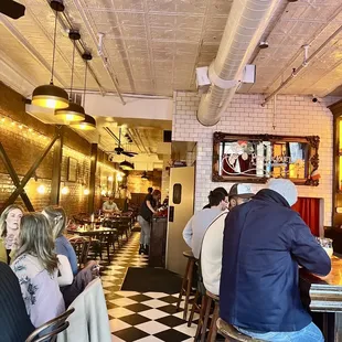 people sitting at the bar