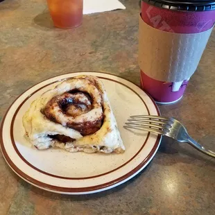 Fresh baked cinnamon roll and latte. Delicious!
