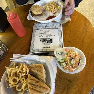 Chicken Panini, curly fries, Burger, &amp; side salad.