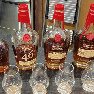 a variety of bottles and glasses