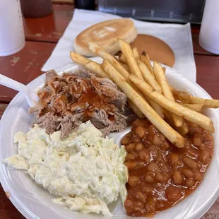 Meat no smoke flavor, beans good, slaw store bought, fries good, sauce runny no flavor.