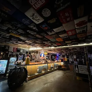 The basement bar complete with a collection of shirts almost as impressive as your dad's.