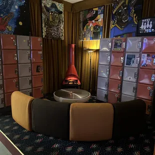 a row of refrigerators in a room