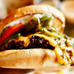 Classic Double Cheeseburger with cheddar, japs, mayo, tomato and pickles. (Burger was not seasoned at all lacked flavor )