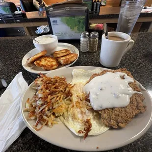 Country fried Steak and Eggs, Hash-browns,Biscuits and gravy side, and always filled right up coffee.