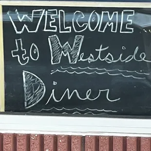 Welcome sign when you pull up and park.
