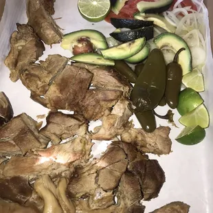 a plate of meat and vegetables