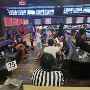 Friendly competition between the Phenomenal Strikers and the Hot Mamas Club