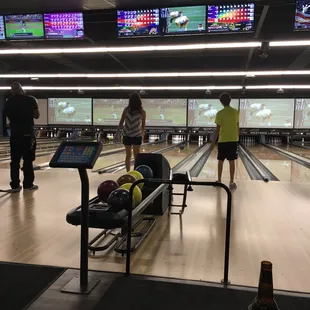 Mom and son bowling together...