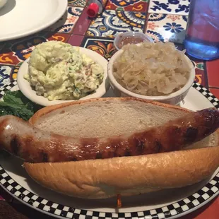 Germane bratwurst with sauerkraut and potato salad.