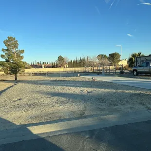 The driveway and the rock base come in handy in the rain!  No walking thru puddles trying to get into your RV!