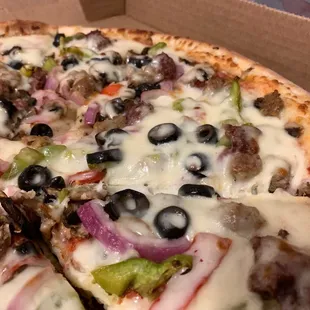 Freight Car Pizza - Tons of cheese and toppings.