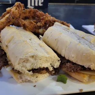 Cheesesteak with onion rings ($2 upcharge)