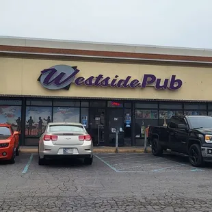 cars parked in front of the store