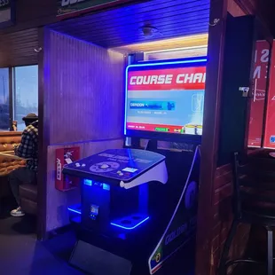 a video game in a booth
