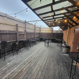 patio area with tables and chairs