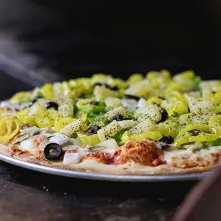 a pizza being cooked in an oven
