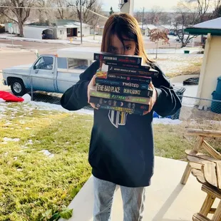 1/2 are my books and 1/2 are hers. We love Westside Stories!!