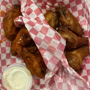 Original hot wings on the left and honey flavored on the right