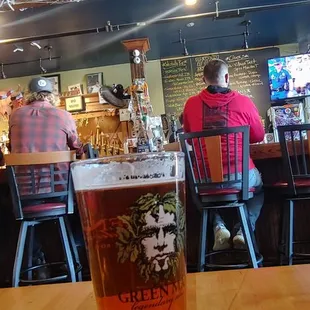 a pint of beer in a pint glass