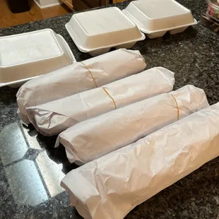 Four 12&quot; poboys and three large orders of fries. That&apos;s how big the poboys are!