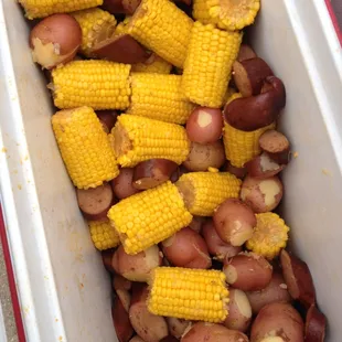 Spicy sausage, corn and potatoes to go with our crawfish!