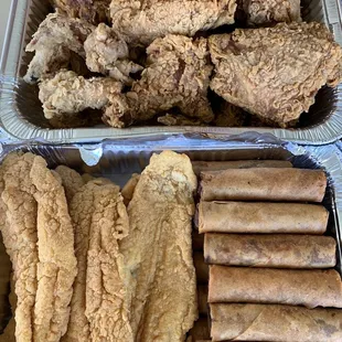 Fried chicken, catfish and egg rolls.
