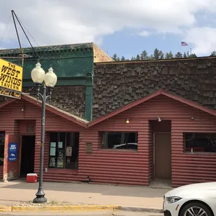 a car parked in front of it