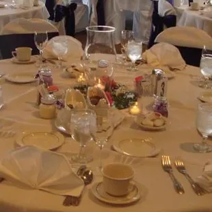 a table set for a wedding reception