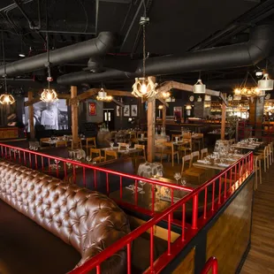 An elevated mezzanine overlooks the dining floor (also used for weekly line dancing) and a stage for weekly acoustic sets and live bands.