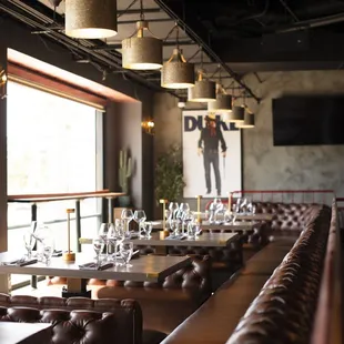 Our tribute to the Duke lies at the end of an elevated Mezzanine that can host semi-private dinners or bottle service for up to 60!