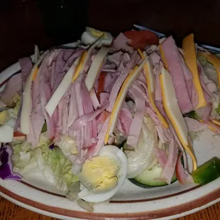 Chef salad and grilled chicken breast salad