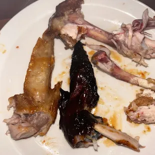 The blood is oozing out of the bone that was the raw chicken that was brought out to us.