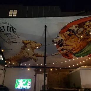 a large banner with dogs on it