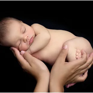Holding Newborn