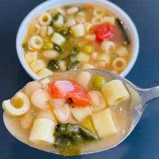 a spoon full of soup