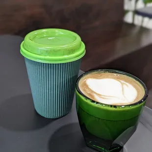 a cup of coffee and a cup of cappuccino