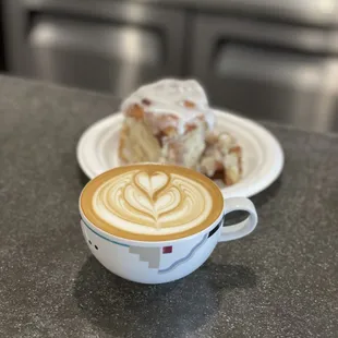 a cup of coffee and a pastry